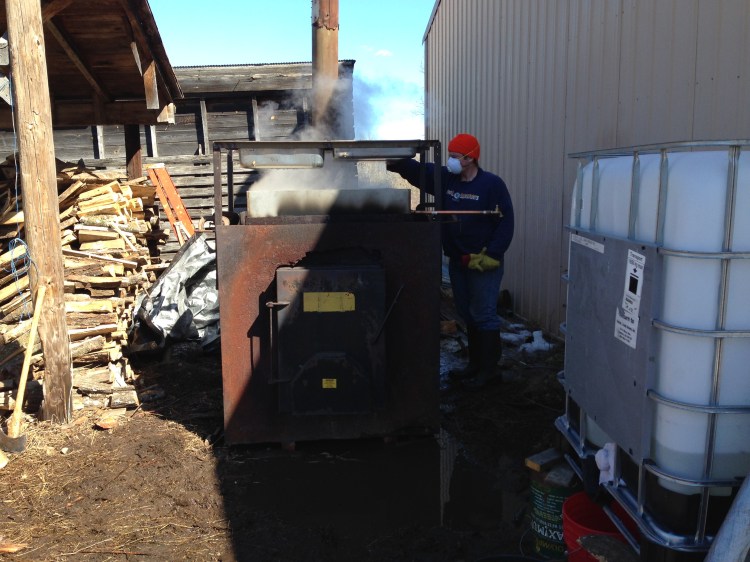 Sap collector on the right. Wood boiler center. Sap on top.